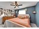 Spacious main bedroom with eclectic decor and a ceiling fan at 901 King St, Plant City, FL 33563