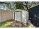 A convenient backyard storage shed, providing space for gardening tools and outdoor equipment at 901 King St, Plant City, FL 33563
