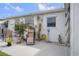 Relaxing patio space with outdoor seating and lush tropical plants, ideal for enjoying the Florida sunshine at 10008 Daffodil N St # 186, Pinellas Park, FL 33782