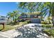 Charming two-story home with a well-manicured lawn and inviting curb appeal at 10404 Crestfield Dr, Riverview, FL 33569