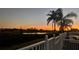 Sunset view of lake from backyard deck at 10404 Crestfield Dr, Riverview, FL 33569