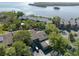 Stunning aerial view of waterfront property with lush landscaping and serene water views at 1111 N Bayshore Blvd # E3, Clearwater, FL 33759