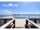 A wooden dock provides stunning views of the open water at 1111 N Bayshore Blvd # E3, Clearwater, FL 33759