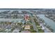 Lovely waterfront home with lush landscaping, boat access in serene coastal community at 11755 7Th E St, Treasure Island, FL 33706