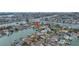 Waterfront property with boat dock access, landscaping in a serene coastal community at 11755 7Th E St, Treasure Island, FL 33706