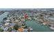 Beautiful waterfront property features boat dock access in tranquil neighborhood at 11755 7Th E St, Treasure Island, FL 33706