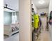 Open view from the Primary bedroom to the walk-in closet, showing the bedroom's neutral colors at 14426 Haddon Mist Dr, Wimauma, FL 33598
