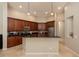 Kitchen with a center island, granite countertops, and stainless steel appliances at 14809 Tudor Chase Dr, Tampa, FL 33626