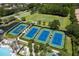 Aerial view of the community tennis courts, and lounging area at 14809 Tudor Chase Dr, Tampa, FL 33626
