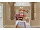 Formal dining room showcasing elegant furniture and a traditional china cabinet at 17108 Longacres Ln, Odessa, FL 33556