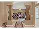 Home office featuring lots of bookshelves, and a view into another home office at 17108 Longacres Ln, Odessa, FL 33556