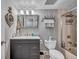 Bathroom showcases a vanity, a walk-in shower, and modern fixtures at 17940 Gulf Blvd # 2D, Redington Shores, FL 33708