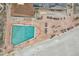 Aerial view of the pool area, with deck chairs, a beachfront setting, and great vacation amenities at 17940 Gulf Blvd # 2D, Redington Shores, FL 33708