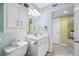 Clean and well-lit bathroom featuring a modern vanity and fixtures at 19417 Gulf Blvd # B-210, Indian Shores, FL 33785