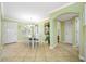 Charming dining area with tiled flooring that leads to other rooms in the home at 19417 Gulf Blvd # B-210, Indian Shores, FL 33785