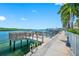 Dock and waterfront area with calm waters and clear blue skies at 19417 Gulf Blvd # B-210, Indian Shores, FL 33785