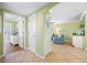 Open entryway that flows into the living room, with great lighting and comfortable seating at 19417 Gulf Blvd # B-210, Indian Shores, FL 33785