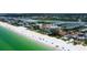 Expansive aerial view showcasing the beachfront community along the shores of the Gulf of Mexico at 19816 Gulf Boulevard # 201, Indian Shores, FL 33785