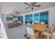 Expansive balcony with ocean views, ceiling fans, and ample seating for relaxation at 19816 Gulf Boulevard # 201, Indian Shores, FL 33785