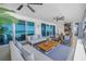 Spacious, sunny balcony offering ocean views, stylish seating, and plenty of room to relax at 19816 Gulf Boulevard # 201, Indian Shores, FL 33785