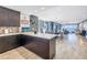 Open concept kitchen with a serving area that overlooks the dining and living spaces at 19816 Gulf Boulevard # 201, Indian Shores, FL 33785