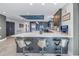 Kitchen with spacious island, modern appliances, and bar seating, perfect for entertaining at 19816 Gulf Boulevard # 201, Indian Shores, FL 33785