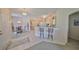 Inviting living area with an open design, perfect for entertaining, featuring a breakfast bar and dining area at 2112 Acadia Greens Dr # 62, Sun City Center, FL 33573