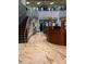 Elegant lobby with marble floors, staircase, and reception desk at 2112 Acadia Greens Dr # 62, Sun City Center, FL 33573