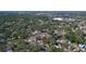 The aerial perspective shows the location of the house within the community of homes and roadways and businesses at 2125 Acorn S Pl, St Petersburg, FL 33712