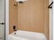 This bathroom features a square rainfall shower head and bright wooden backsplash at 2125 Acorn S Pl, St Petersburg, FL 33712