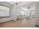 Bright living room featuring wood flooring, modern furniture, and neutral decor at 2125 Acorn S Pl, St Petersburg, FL 33712