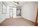 Spacious room features a sliding barn door leading to a modern bathroom with mosaic tile floor at 2125 Acorn S Pl, St Petersburg, FL 33712