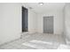 Bright room with tile floors, a closet with folding doors and a door to another room at 2125 Acorn S Pl, St Petersburg, FL 33712