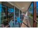 Comfortable balcony features brick tile flooring and outdoor seating area with an open view at 3021 Countryside Blvd # 24A, Clearwater, FL 33761