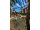 Attractive condo buildings featuring lush tropical landscaping, fountains, and a winding waterway at 3021 Countryside Blvd # 24A, Clearwater, FL 33761