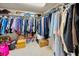 Spacious walk-in closet with ample storage and shelving for organizing clothes and accessories at 3021 Countryside Blvd # 24A, Clearwater, FL 33761