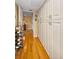 Hallway with ample storage space and wooden floors at 3021 Countryside Blvd # 24A, Clearwater, FL 33761