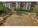 Picturesque condo community with a pond, fountain, lush landscaping, and meticulously maintained grounds at 3021 Countryside Blvd # 24A, Clearwater, FL 33761