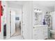 Bright, updated bathroom with modern vanity, sleek fixtures, and convenient access at 3323 Ringwood Mdw, Sarasota, FL 34235