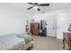 Functional bedroom featuring closet space and a dresser for storage at 3323 Ringwood Mdw, Sarasota, FL 34235