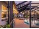 Enjoy indoor/outdoor living with a covered lanai and screened-in pool at 3323 Ringwood Mdw, Sarasota, FL 34235