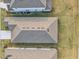 Birds eye view of a roof top, showcasing quality building and design at 33886 Landsman Loop, Wesley Chapel, FL 33543