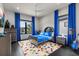 Bright bedroom featuring colorful decor, unique windows, and modern furnishings at 5131 W Neptune Way, Tampa, FL 33609