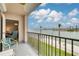 Balcony view of waterfront, palm trees, and skyline at 5220 Brittany S Dr # 210, St Petersburg, FL 33715