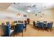 Community game room features poker tables, and comfortable seating for entertainment at 5220 Brittany S Dr # 210, St Petersburg, FL 33715