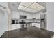 Updated kitchen features stainless steel appliances, granite countertops, and ample cabinet space at 5220 Brittany S Dr # 210, St Petersburg, FL 33715