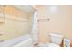 Clean bathroom featuring a tiled shower-tub combo and a toilet, designed for everyday comfort and convenience at 5248 Coral N Way, St Petersburg, FL 33714