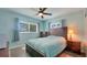 Cozy bedroom with natural light, a comfortable queen-size bed, and tranquil atmosphere for peaceful sleep at 5248 Coral N Way, St Petersburg, FL 33714