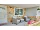 Charming front porch with comfortable seating and decorative flower box at 5248 Coral N Way, St Petersburg, FL 33714