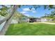 Charming single-story home with manicured lawn, stone accents and cozy covered porch at 5248 Coral N Way, St Petersburg, FL 33714